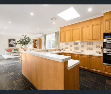 CHARMING VICTORIAN-INSPIRED HOME IN A BRIGHT, LOW MAINTENANCE GARDE... - Photo 2