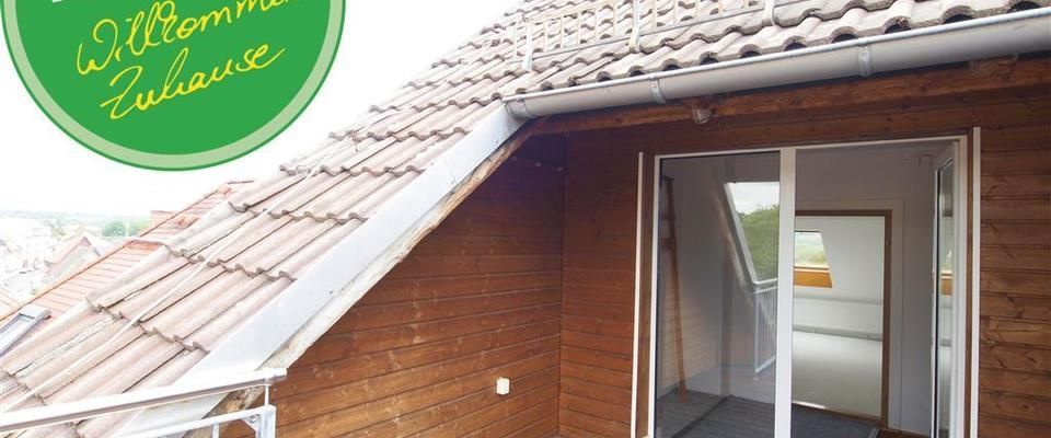 Wohnen mit Dachterrasse und Kaminofen in der Innenstadt! - Photo 1