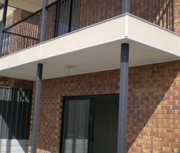 Modern 3-Bedroom Townhouse with Garage & Great Features - Photo 2