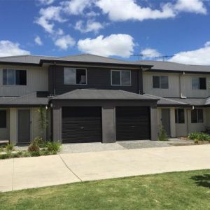 Stylish 3-Bedroom Townhouse in the Heart of Redbank Plains - Photo 3