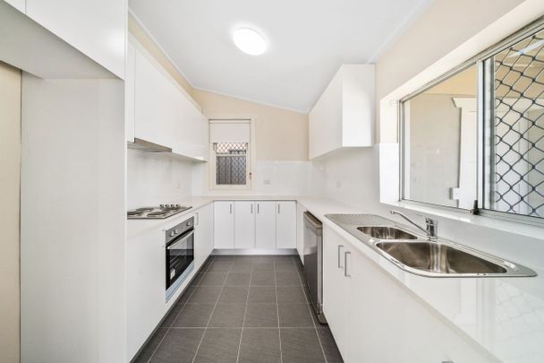 Elevated Freestanding Cottage with Generous Yard - Photo 1