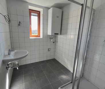 Gut aufgeteilte 4-Zimmer-Wohnung mit Balkon und Carportparkplatz - Photo 2