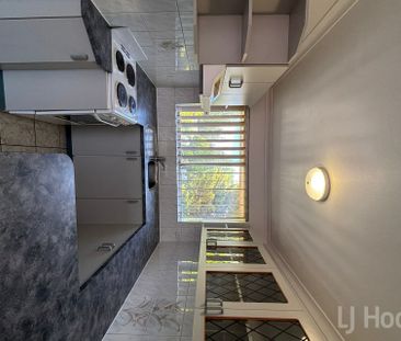 Two Bedroom Top Floor Unit - Photo 1