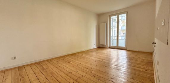 3- Zimmerwohnung mit abgeschliffenen Dielen und Balkon - Foto 2