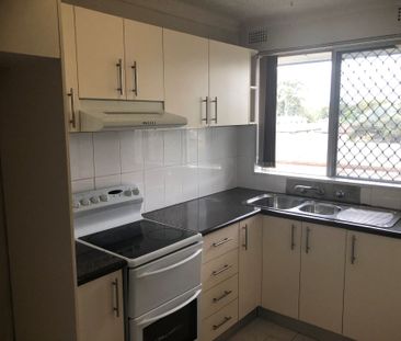 Perfectly Positioned 2-Bedroom Unit - Photo 1