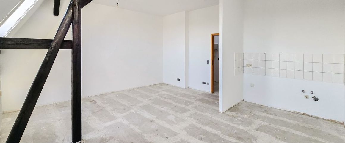 Dachgeschosswohnung mit Flair nahe der Saale! - Foto 1