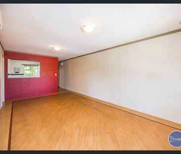 LOW-MAINTENANCE LIVING IN A CONVENIENT LOCATION - Photo 1