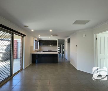 FAMILY HOME IN IN THE COLLEGE GREEN ESTATE! - Photo 2