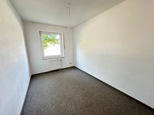 schöne Erdgeschoss Wohnung mit Terrasse - Foto 1