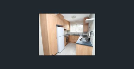 Spacious Two-Bedroom Home with Modern Comforts and Low-Maintenance Living - Photo 2