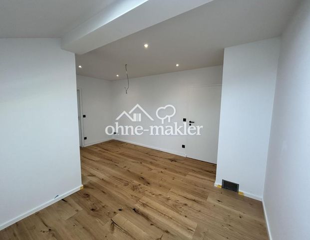 Elegante Wohnung mit hochwertiger Sanierung und Blick direkt in den Wald - Photo 1