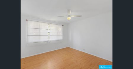 Comfortable Family Living with a Generous Backyard - Photo 3