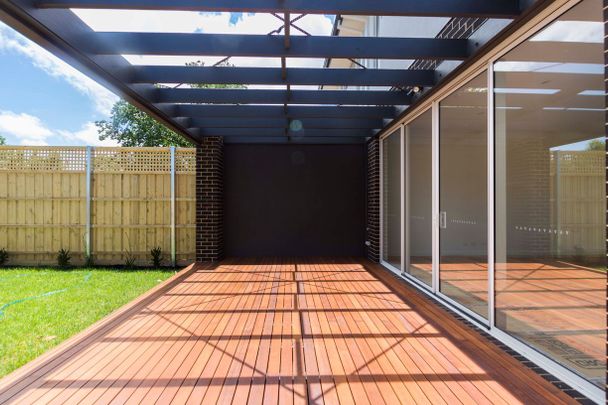 Modern & Roomiest Home in the McKinnon Zone - Photo 1