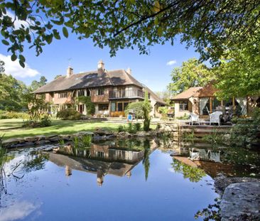 A 'Tarrant' home providing well proportioned and spacious accommodation and set in south facing grounds of about 2 acres on the main island of Wentworth Estate. - Photo 1