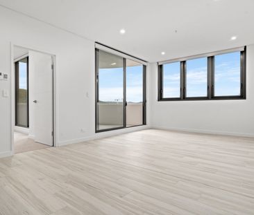 Luxury Living at the Archibald – Stunning Water & District Views - Photo 2