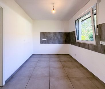 Familienfreundliches Wohnen nah am Zentrum – gepflegtes Reihenmittelhaus mit Garten und Garage - Photo 4