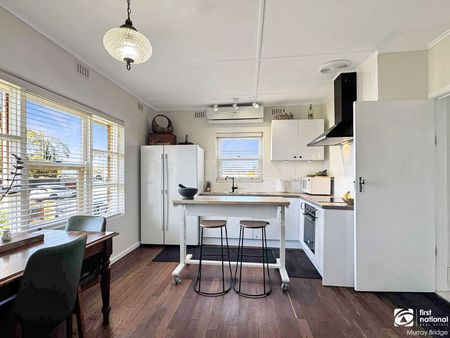 Central Living with Comfort and Space - Photo 4