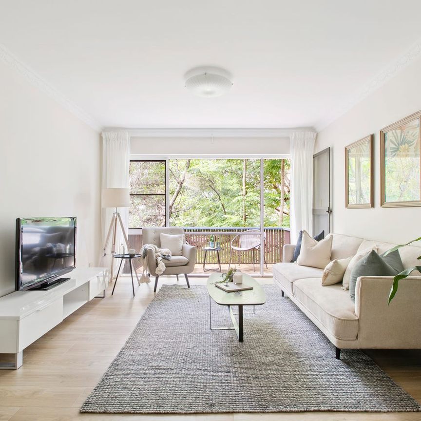 QUIET, PRIVATE OVER-SIZED APARTMENT IN CENTRAL SETTING - Photo 1