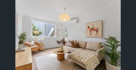 Sunlit Apartment Living Steps from Rathdowne Village Charm - Photo 3