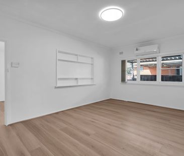 Freshly Renovated Family Home in Prime Location - Photo 6