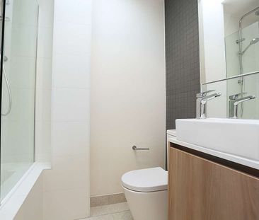 STYLISH DOUBLE-STORY APARTMENT WITH MODERN AMENITIES - Photo 2