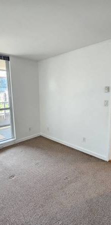 1 Bedroom + Den + 1 Parking- Well-Located - Photo 1