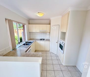 Spacious Three-Bedroom Townhouse with Convenient City Access - Photo 6