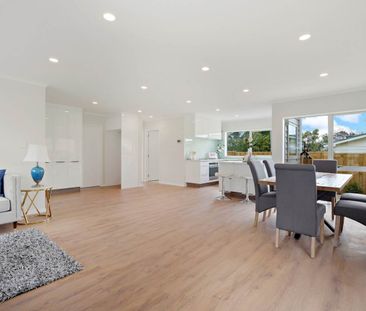 This modern 5-bedroom home offers space, comfort, and a great location - Photo 4