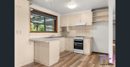 FRESHLY UPDATED FAMILY HOME IN A GREAT LOCATION - Photo 4