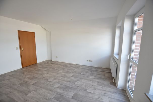 Maisonettewohnung im Zentrum von Warsingsfehn - Photo 1
