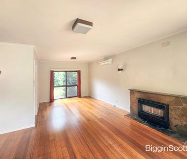 Cozy Three-Bedroom Home with Modern Amenities and Convenient Location - Photo 4
