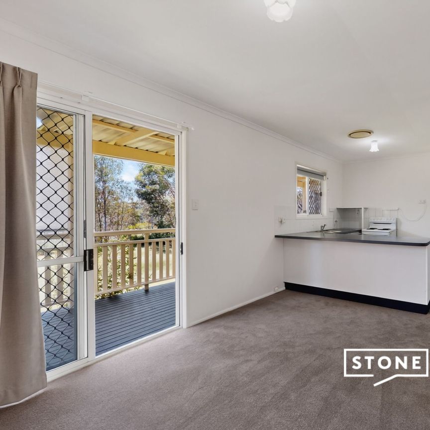 Low-Maintenance Living in a Quiet Complex with Pool – Perfect Location! - Photo 1