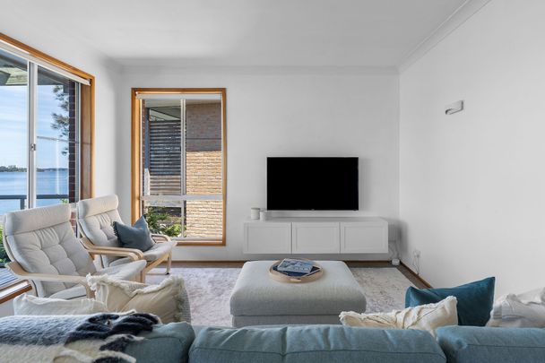 ABSOLUTE WATERFRONT LIVING - FULLY FURNISHED & READY TO ENJOY! - Photo 1