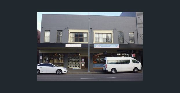 Neat Two Bedroom Unit in CBD Location! - Photo 1