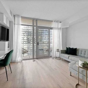 Condo Rental - Stylish 1 Bed, 1 Bath with Balcony, City & Water Views - Photo 2