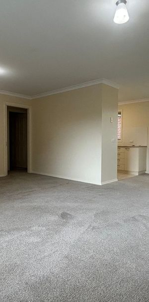 COMFORTABLE TWO-BEDROOM TOWNHOUSE IN A CONVENIENT LOCATION - Photo 1