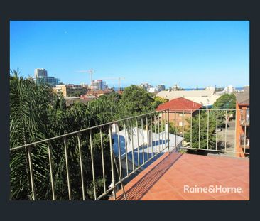 LARGE UNIT WITH OCEAN GLIMPSES! - Photo 4