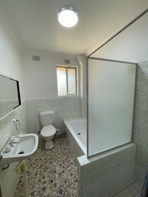 Freshly Renovated 2-Bedroom Unit in Prime Location - Photo 1