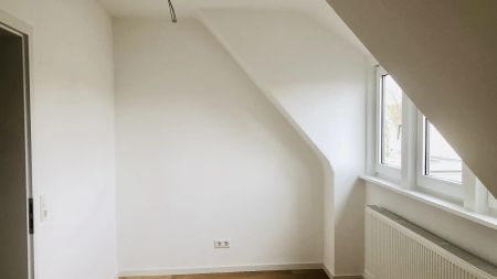 Sanierte Dachgeschosswohnung direkt in der Innenstadt - Photo 2