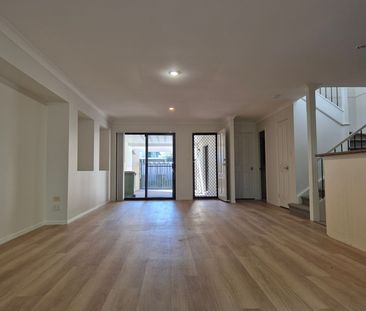 RENOVATED THREE BEDROOM TOWNHOUSE IN GATED COMPLEX WITH POOL LOCATE... - Photo 5