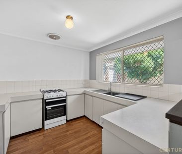 Low Maintenance Villa in Prime Location - Photo 1