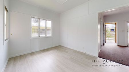 High-set family home in central location - Photo 5