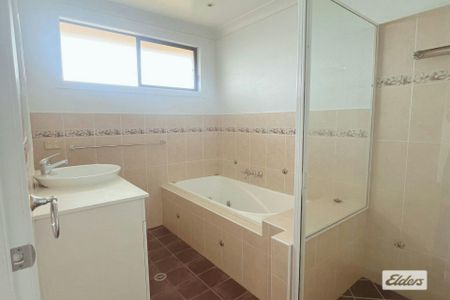 Generous Living Across Five Bedrooms - Photo 2