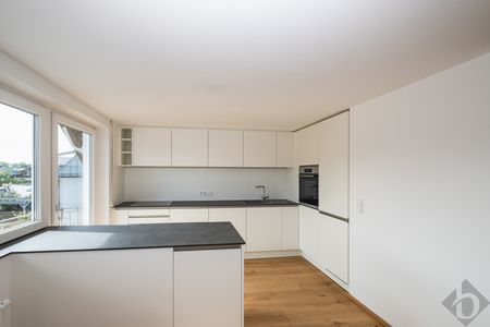 Geräumige Dachgeschoßwohnung mit Garten direkt am Mühlbach - Photo 2