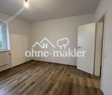 Erdgeschosswohnung mit Terrasse und Garten in Bockhornerfeld - Photo 1