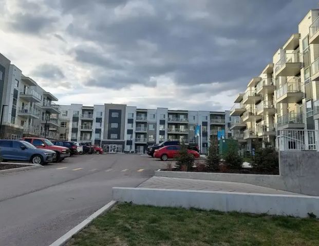 Mountain VIEW! 2 Bed + 2 Full Bath + AC | 3404 - 220 Seton Grove Southeast, Calgary - Photo 1