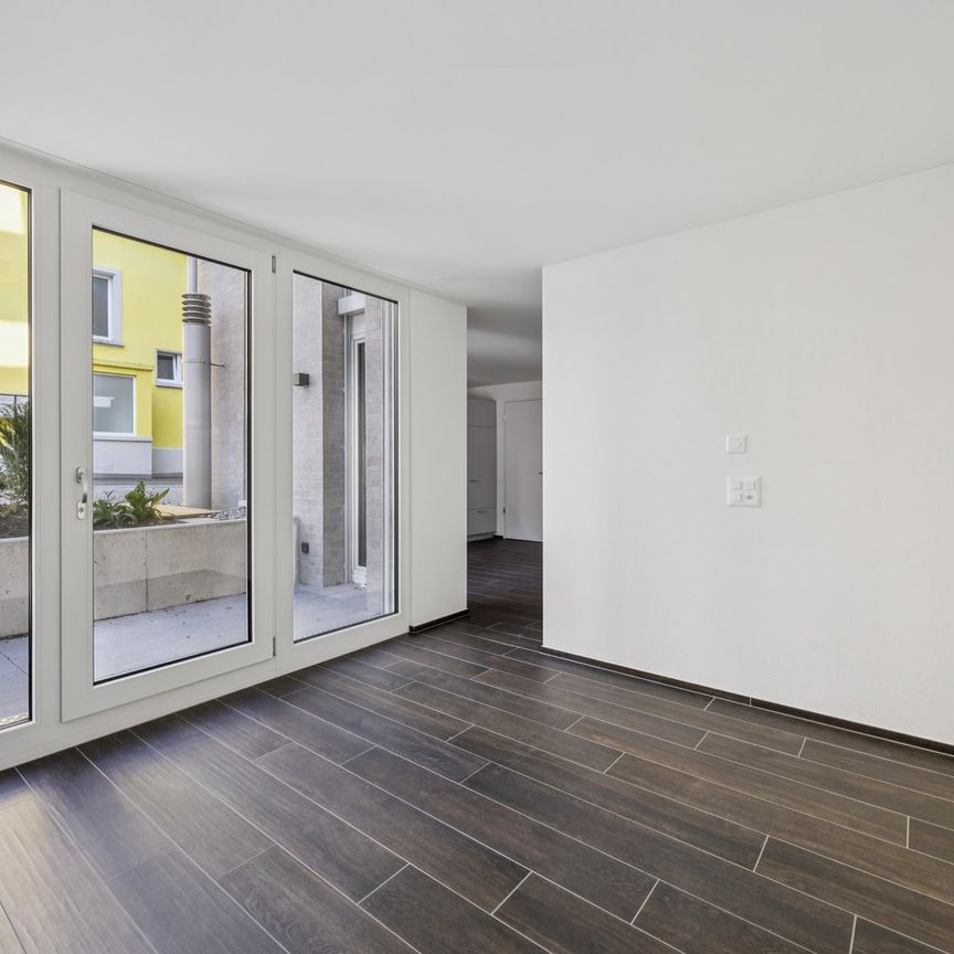 ERSTVERMIETUNG: Moderne Split-Level-Wohnung mit Charme in Zürich-Oerlikon - Photo 1