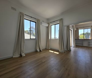 Fully Renovated Home with Stunning City Views - Photo 4