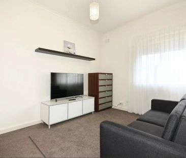 Fully Furnished Studio in a Prime Location! - Photo 1