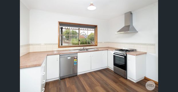 NEAT 3 BEDROOM HOME - PERFECT FOR A YOUNG FAMILY! - Photo 1